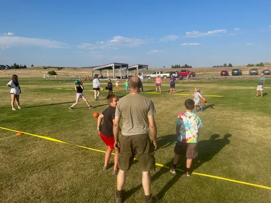 Youth playing dodgeball.