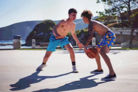 Youth playing basketball