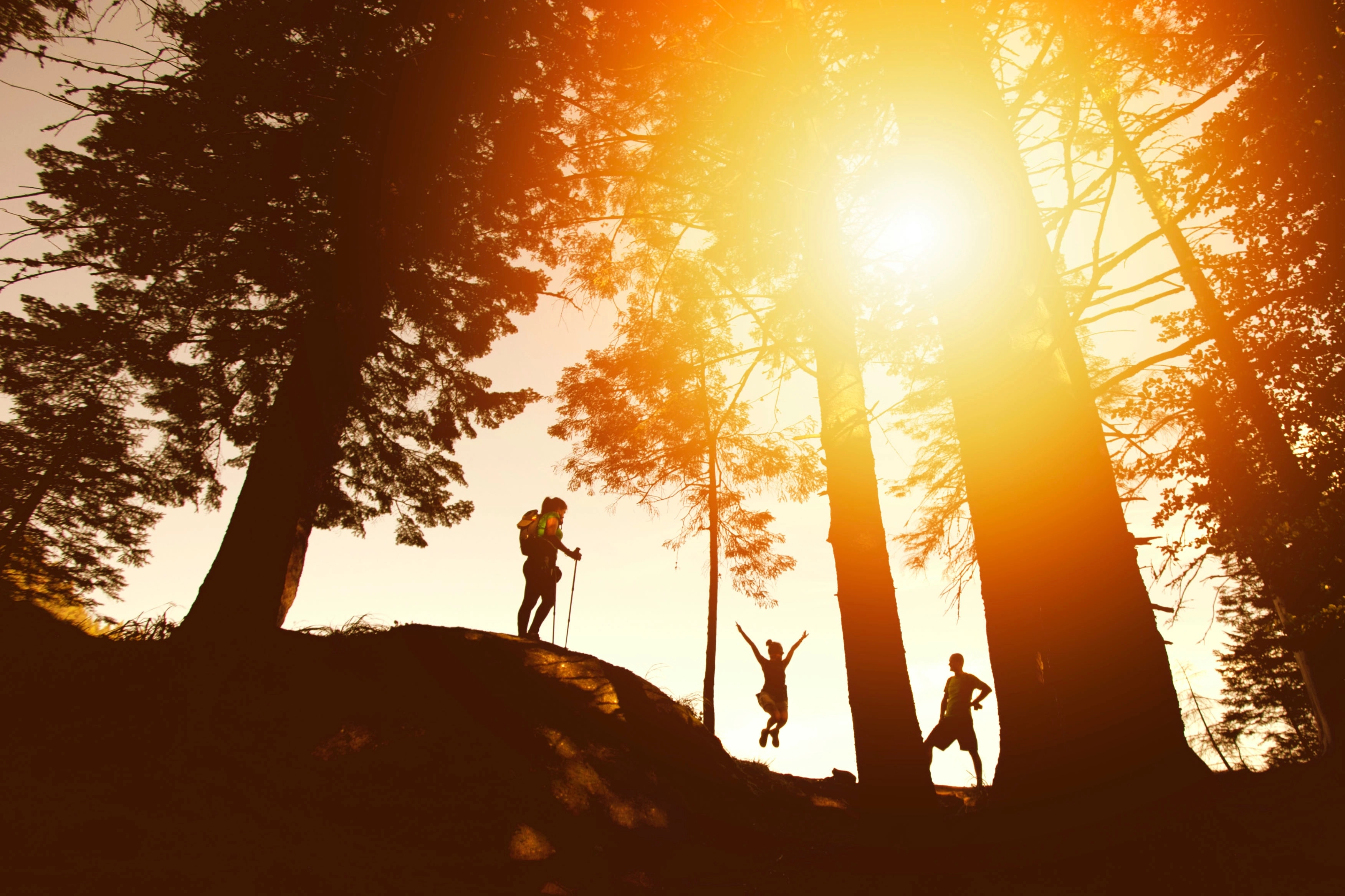 Three youth on a hike